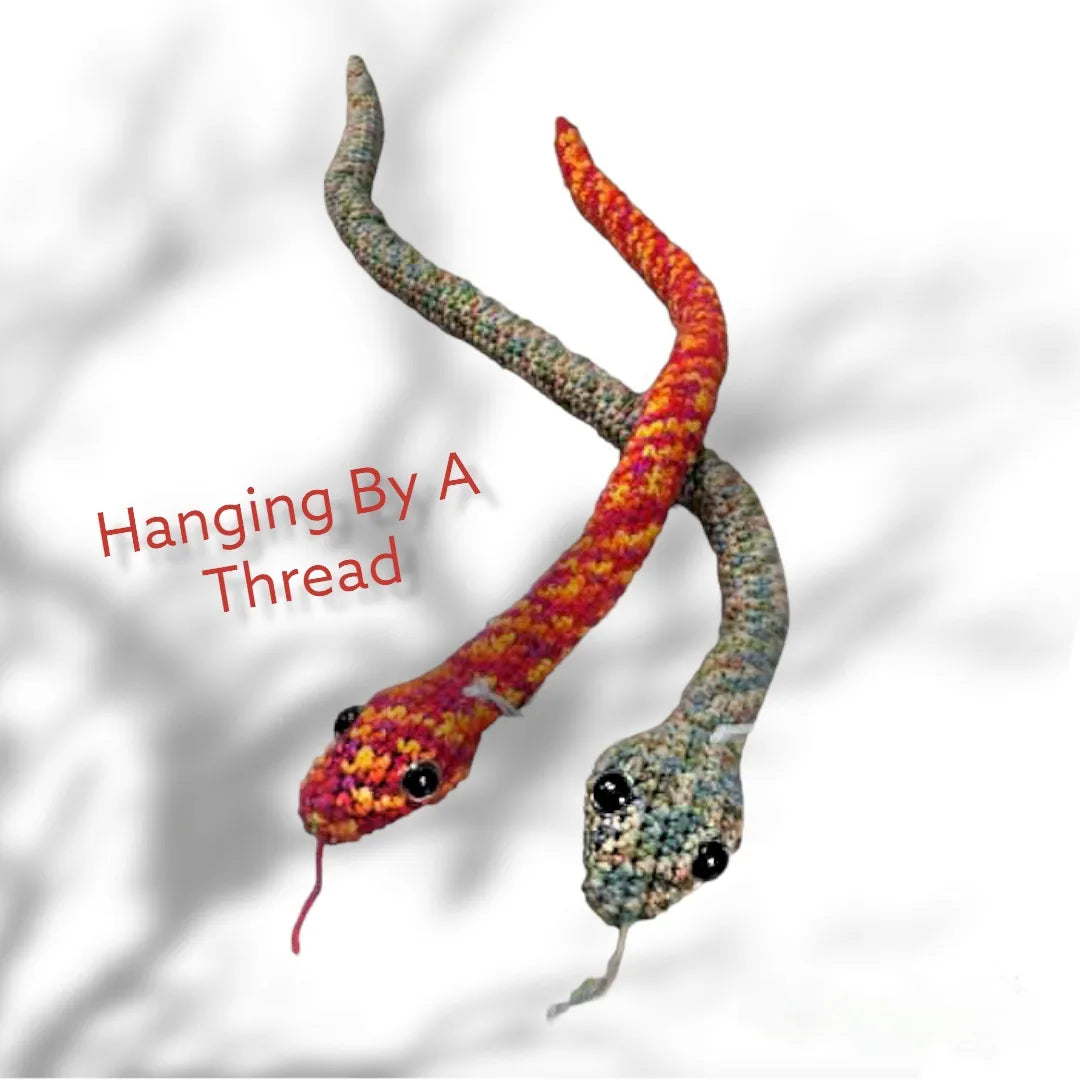 Medium red snake by Hanging By A Thread