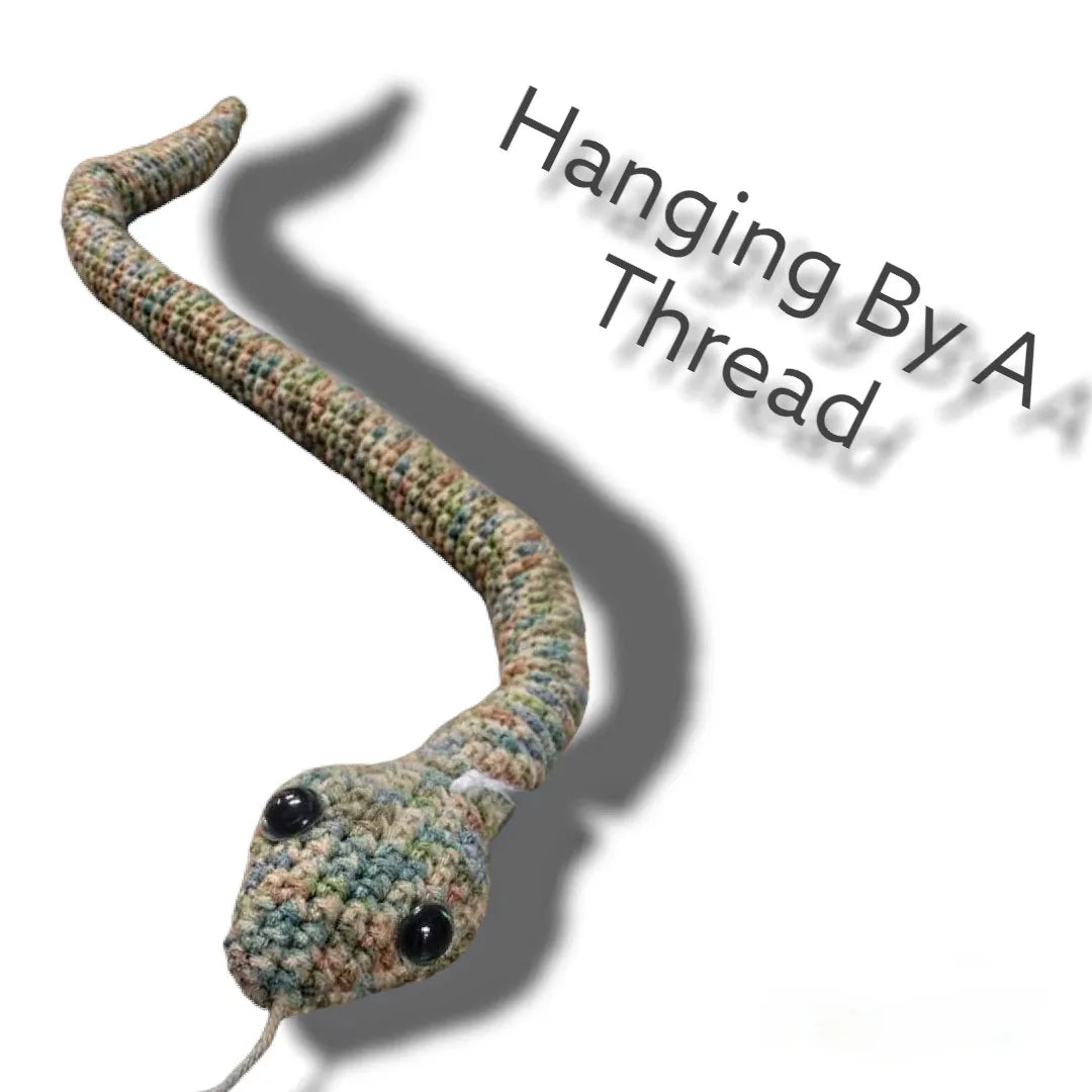 Large green snake by Hanging By A Thread